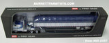 Item #60-2057 Blue White Black Outline Peterbilt 352 COE 110-inch Sleeper with White Sided Blue Tarp Blue Frame Spread Axle Wilson Roadbrute 53-foot Flatbed Covered Wagon Trailer - 1/64 Scale – DCP by First Gear