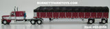 Item #60-2058 Burgundy White Black Outline Peterbilt 389 63-inch Flattop Sleeper with Burgundy Sided Black Tarp Silver Frame Spread Axle Wilson Roadbrute 53-foot Flatbed Covered Wagon Trailer - 1/64 Scale – DCP by First Gear