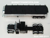 Item #60-2111 Black White Peterbilt 389 48-inch Flattop Sleeper with Chrome Sided Black Tarp Black Frame Tri-Axle MAC Coal Dump Trailer - 1/64 Scale – DCP by First Gear