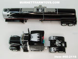 Item #60-2116 Black Silver Flame Peterbilt 389 70-inch Mid Roof Sleeper with Black Silver Flame Tandem Axle Brenner Chemical Tanker Trailer - 1/64 Scale – DCP by First Gear