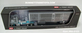 Item #60-2123 Dark Gray Silver Turquoise Kenworth K100 COE Aerodyne Sleeper with Dark Gray Sided Silver Trim Spread Axle Wilson Silver Star Livestock Trailer - 1/64 Scale – DCP by First Gear