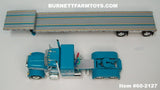 Item 60-2127 Turquoise White Stripe Silver Outline Peterbilt 379 48-inch Flattop Sleeper with Silver Deck Turquoise Frame Spread Axle Transcraft Eagle Stepdeck Trailer - 1/64 Scale – DCP by First Gear