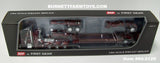 Item #60-2129 Burgundy Silver Flame Red Outline Tri-Axle Peterbilt 389 36-inch Flattop Sleeper with Burgundy Tri-Axle Heavy Haul Fontaine Magnitude Lowboy Trailer with Jeep and Stinger - 1/64 Scale – DCP by First Gear