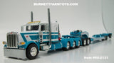 Item #60-2131 Aqua Blue White Tri-Axle Peterbilt 389 36-inch Flattop Sleeper with Aqua Blue Tri-Axle Heavy Haul Fontaine Magnitude Lowboy Trailer with Jeep and Stinger - 1/64 Scale – DCP by First Gear