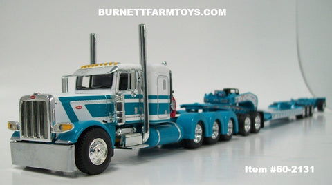 Item #60-2131 Aqua Blue White Tri-Axle Peterbilt 389 36-inch Flattop Sleeper with Aqua Blue Tri-Axle Heavy Haul Fontaine Magnitude Lowboy Trailer with Jeep and Stinger - 1/64 Scale – DCP by First Gear