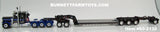 Item #60-2132 Black Blue Silver Outline Tri-Axle Peterbilt 389 36-inch Flattop Sleeper with Black Tri-Axle Heavy Haul Fontaine Magnitude Lowboy Trailer with Jeep and Stinger - 1/64 Scale – DCP by First Gear