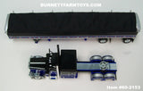 Item #60-2153 Black Blue Silver Peterbilt 389 Pride-N-Class 63-inch Flattop Sleeper with Matching Spread Axle Wilson Pacesetter 50-foot Hopper Bottom Grain Trailer - 1/64 Scale – DCP by First Gear