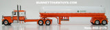 Item #60-2179 Orange White Black Outline Peterbilt 389 36-inch Flattop Sleeper with White Orange Tandem Axle Mississippi LPG Anhydrous Ammonia Tanker Trailer - 1/64 Scale – DCP by First Gear