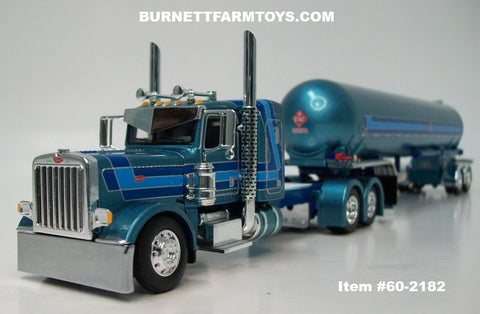 Item #60-2182 Aqua Metallic Blue Silver Outline Peterbilt 389 36-inch Flattop Sleeper with matching Tandem Axle Mississippi LPG Propane Tanker Trailer - 1/64 Scale – DCP by First Gear