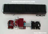 Item #60-2193 Burgundy Black Stripe Gray Stripe Silver Outline Peterbilt 379 48-inch Flattop Sleeper with Black High Sided Black Tarp Silver Frame Tandem Axle Wilson 43-foot Pacesetter Hopper Bottom Grain Trailer - 1/64 Scale – DCP by First Gear