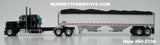 Item #60-2196 Black Peterbilt 379 48-inch Flattop Sleeper with White High Sided Black Tarp Silver Frame Tandem Axle Wilson 43-foot Pacesetter Hopper Bottom Grain Trailer - 1/64 Scale – DCP by First Gear