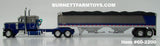 Item #60-2200 Gun Metal Gray Metallic Blue Metallic Peterbilt 379 48-inch Flattop Sleeper with Gun Metal Gray Blue High Sided Black Tarp Silver Frame Tandem Axle Wilson 43-foot Pacesetter Hopper Bottom Grain Trailer - 1/64 Scale – DCP by First Gear