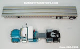 Item #60-2206 White Turquoise Peterbilt 379 36-inch Flattop Sleeper with Silver Deck Black Frame Spread Axle Wilson Roadbrute 53-foot Flatbed Trailer - 1/64 Scale – DCP by First Gear