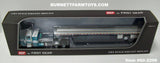Item #60-2206 White Turquoise Peterbilt 379 36-inch Flattop Sleeper with Silver Deck Black Frame Spread Axle Wilson Roadbrute 53-foot Flatbed Trailer - 1/64 Scale – DCP by First Gear
