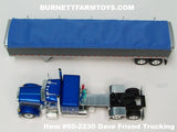 Item #60-2230 Dave Friend Trucking Blue Dark Gray White Peterbilt 379 48-inch Flattop Sleeper with Dark Gray High Sided Blue Tarp Tandem Axle Wilson Pacesetter Hopper Bottom Grain Trailer - 1/64 Scale – DCP by First Gear