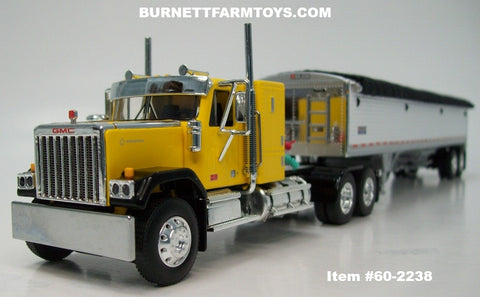 Item #60-2238 Yellow Black Fender GMC General 34-foot Flattop Sleeper with White Sided Black Tarp Silver Frame Tandem Axle Wilson Pacesetter 43-foot Hopper Bottom Grain Trailer - 1/64 Scale – DCP by First Gear