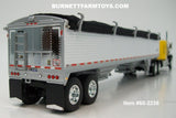Item #60-2238 Yellow Black Fender GMC General 34-foot Flattop Sleeper with White Sided Black Tarp Silver Frame Tandem Axle Wilson Pacesetter 43-foot Hopper Bottom Grain Trailer - 1/64 Scale – DCP by First Gear