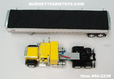 Item #60-2238 Yellow Black Fender GMC General 34-foot Flattop Sleeper with White Sided Black Tarp Silver Frame Tandem Axle Wilson Pacesetter 43-foot Hopper Bottom Grain Trailer - 1/64 Scale – DCP by First Gear