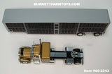 Item #60-2243 Gold Black White Outline Peterbilt 389 48-inch Flattop Sleeper with Black Sided Silver Trim Spread Axle Wilson Silver Star Livestock Trailer - 1/64 Scale – DCP by First Gear