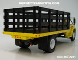 Item #60-2261 Yellow 1963 GMC 4000 Single Axle Stake Bed Truck with Black Bed - 1/64 Scale – DCP by First Gear