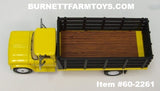 Item #60-2261 Yellow 1963 GMC 4000 Single Axle Stake Bed Truck with Black Bed - 1/64 Scale – DCP by First Gear