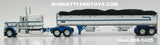 Item #68-1425 Todd Blacker Trucking White Blue Black Outline Peterbilt 359 63-inch Flattop Sleeper with Tandem Axle Wilson Pacesetter Hopper Bottom Grain Trailer - 1/64 Scale - DCP by First Gear