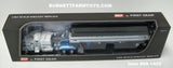 Item #68-1425 Todd Blacker White Blue Black Outline Peterbilt 359 63-inch Flattop Sleeper with Tandem Axle Wilson Pacesetter Hopper Bottom Grain Trailer - 1/64 Scale – DCP by First Gear
