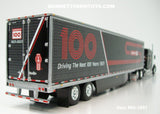 Item #68-1691 Kenworth 100th Anniversary Black Burgundy Gold Stripe Kenworth W900L 86-inch Studio Sleeper with Tandem Axle Utility 53-foot Dry Goods Van Trailer with Skirts - 1/64 Scale – DCP by First Gear