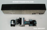 Item #68-2227 Black Light Gray Dark Gray Swoop Stripe Peterbilt 379 63-inch Mid Roof Sleeper with Silver Black Trim Spread Axle Wilson Silver Star Livestock Trailer - 1/64 Scale – DCP by First Gear