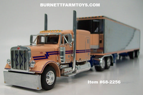 Item #68-2256 Peach Blue Peterbilt 379 63-inch Flattop Sleeper with Chrome Sided Peach Trim Blue Frame Spread Axle Utility 53-foot Carrier Refrigerated Trailer - 1/64 Scale – DCP by First Gear