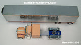 Item #68-2256 Peach Blue Peterbilt 379 63-inch Flattop Sleeper with Chrome Sided Peach Trim Blue Frame Spread Axle Utility 53-foot Carrier Refrigerated Trailer - 1/64 Scale – DCP by First Gear