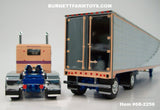 Item #68-2256 Peach Blue Peterbilt 379 63-inch Flattop Sleeper with Chrome Sided Peach Trim Blue Frame Spread Axle Utility 53-foot Carrier Refrigerated Trailer - 1/64 Scale – DCP by First Gear