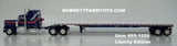 Item #69-1656 Liberty Edition Blue Red and Silver Stripe Kenworth W900A Aerodyne Sleeper with White Deck Blue Frame Tandem Axle Wilson Roadbrute Flatbed Trailer - 1/64 Scale - DCP by First Gear