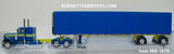 Item #69-1679 DSD Transport Blue Yellow Peterbilt 379 36-inch Sleeper with Blue Tarp Yellow Trim Spread Axle Utility 53-foot Roll Tarp Flatbed Trailer - Big Rigs #12 - 1/64 Scale - DCP by First Gear
