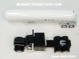 Item #69-2301 Ag Dynasty Black Peterbilt 389 63-inch Flattop Sleeper with White Tandem Axle Mississippi LP Anhydrous Ammonia Tanker Trailer - 1/64 Scale – DCP by First Gear