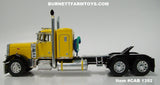 Item #CAB 1392 Yellow Black Fender Peterbilt 379 36-inch Flattop Sleeper - 1/64 Scale – DCP by First Gear