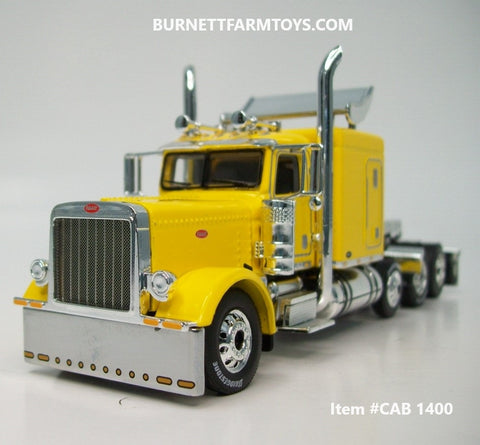 Item #CAB 1400 Yellow Tri-Axle Peterbilt 389 63-inch Flattop Sleeper with Turbo Wing - 1/64 Scale - DCP by First Gear