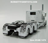 Item #CAB 1476 White Black and Gray Flame Tri-Axle Peterbilt 389 63-inch Flattop Sleeper - 1/64 Scale - DCP by First Gear