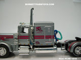 Item #CAB 1510 Mies and Daughter Trucking Silver Pink Black Outline Peterbilt 389 63-inch Flattop Sleeper - 1/64 Scale – DCP by First Gear