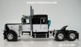 Item #CAB 1653 Black White Peterbilt 389 63-inch Flattop Sleeper - 1/64 Scale - DCP by First Gear