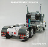 Item #CAB 1748 White Tri-Axle Peterbilt 359 Day Cab with Headache Rack - 1/64 Scale – DCP by First Gear