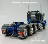 Item #CAB 1749 Blue Silver Metallic Tri-Axle Peterbilt 359 Day Cab with Headache Rack - 1/64 Scale – DCP by First Gear