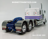 Item #CAB 1802 White Blue Red Outline Tri-Axle Kenworth W900L 60-inch Flattop Sleeper - 1/64 Scale – DCP by First Gear