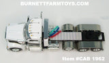 Item #CAB 1962 White Black Gold Outline Tri-Axle Kenworth W990 Day Cab with Enclosed Headache Rack - 1/64 Scale – DCP by First Gear
