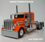 Item #CAB 2007 Orange Cream Black Outline Peterbilt 389 36-inch Flattop Sleeper - 1/64 Scale – DCP by First Gear