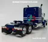 Item #CAB 2025 Blue Metallic White Black Outline Peterbilt 379 63-inch Mid Roof Sleeper - 1/64 Scale – DCP by First Gear