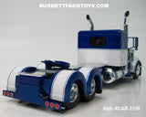 Item #CAB 2110 Blue Metallic White Peterbilt 389 48-inch Flattop Sleeper - 1/64 Scale – DCP by First Gear