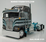 Item #CAB 2123 Dark Gray Silver Turquoise Kenworth K100 COE Aerodyne Sleeper - 1/64 Scale – DCP by First Gear