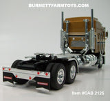 Item #CAB 2125 Gold Black White Outline Kenworth K100 COE Aerodyne Sleeper - 1/64 Scale – DCP by First Gear
