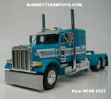 Item #CAB 2127 Turquoise White Stripe Silver Outline Peterbilt 379 48-inch Flattop Sleeper - 1/64 Scale – DCP by First Gear